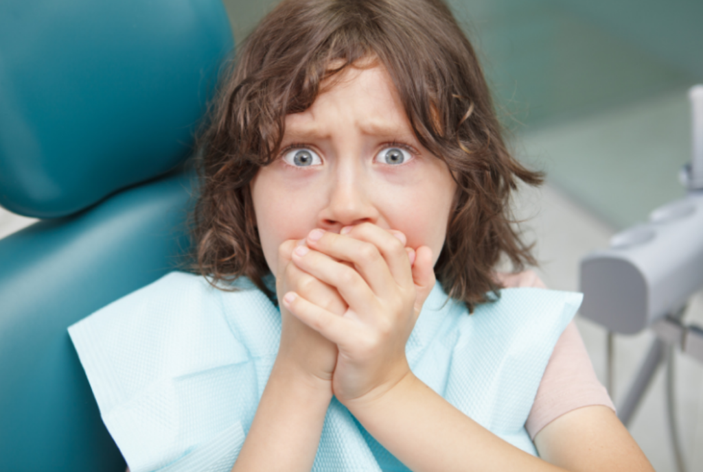 Signs that your child needs to see a dentist and how to encourage kids overcome dental anxiety